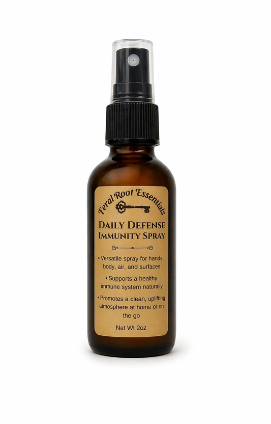 Brown spray bottle labeled 'Daily Defense Immunity Spray' on a white background