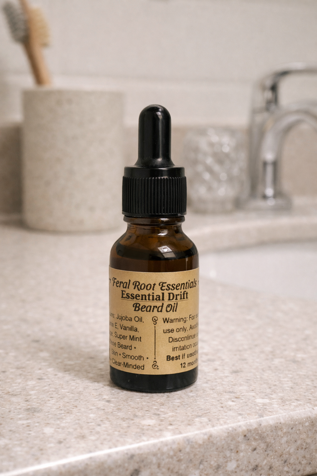 Bottle of Feral Root Essentials Essential Drift Beard Oil on a bathroom counter.