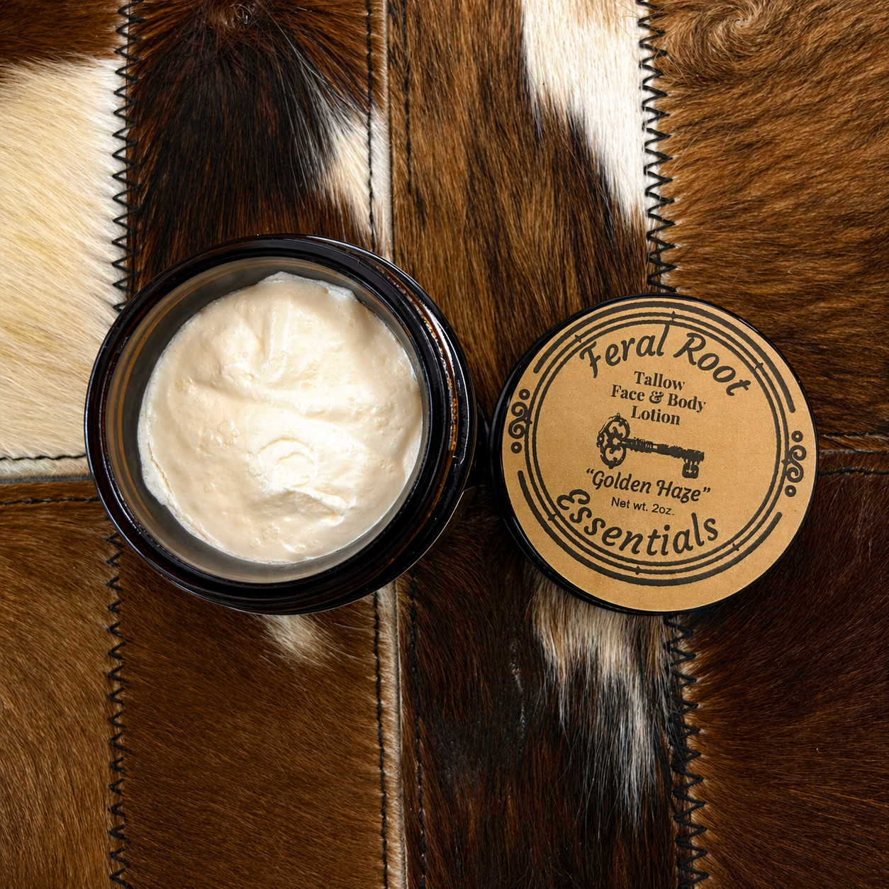 Feral Root Essentials Jar of tallow cream on a fur background
