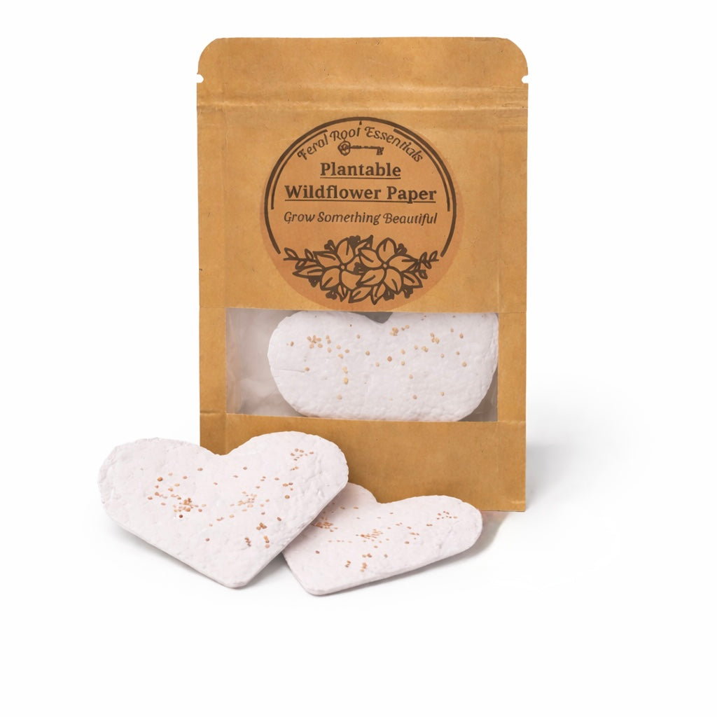 Plantable wildflower seed paper hearts in kraft pouch by Feral Root Essentials
