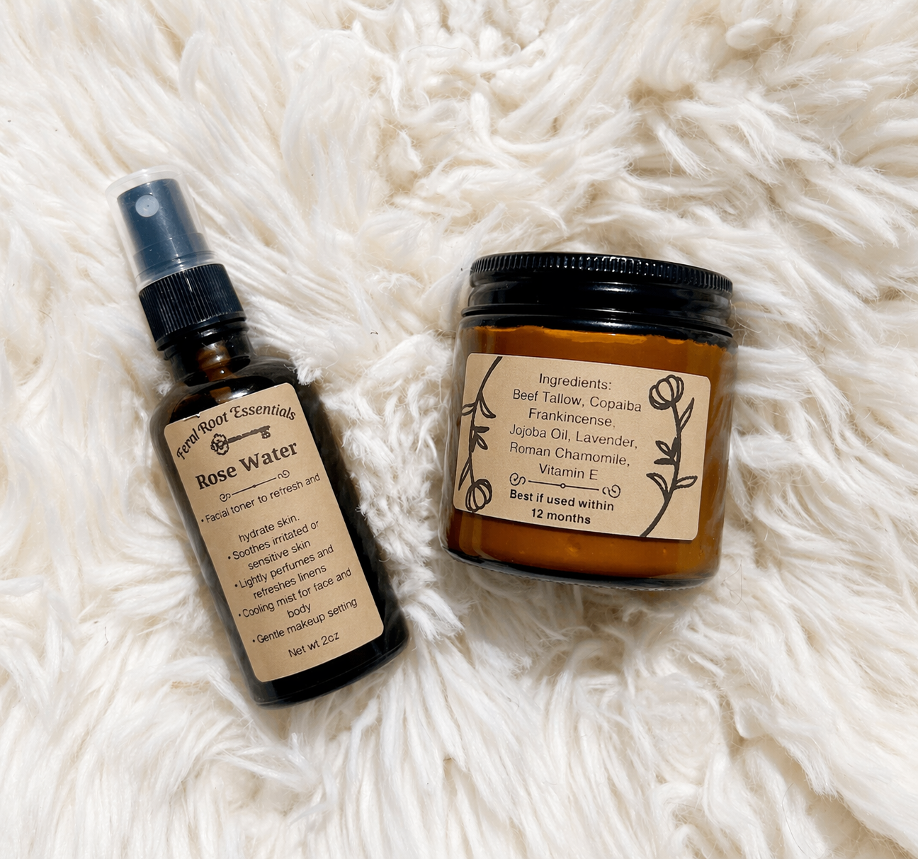 Two skincare products, a rose water  spray bottle and a jar of golden haze tallow, on a fluffy white surface.